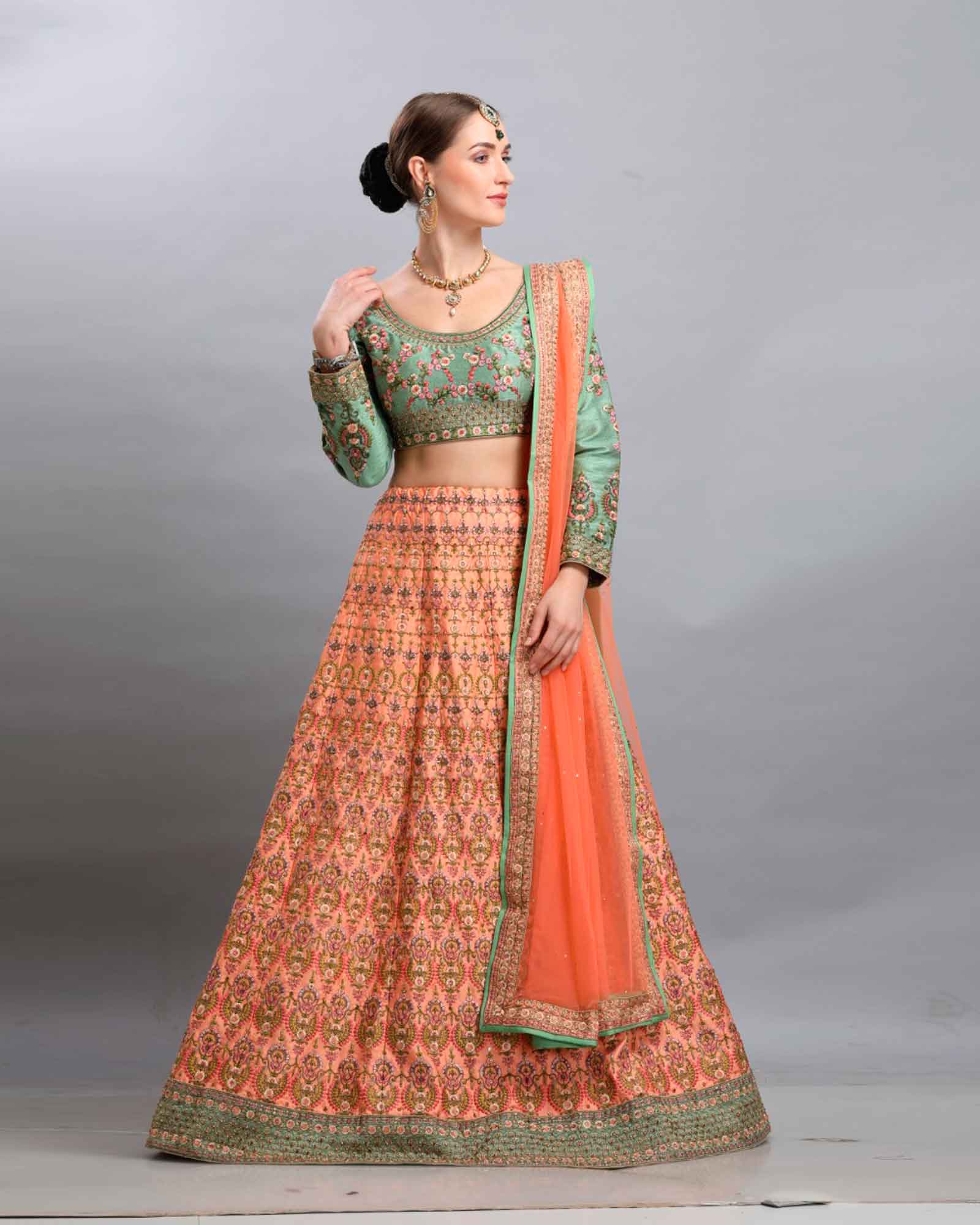 Resham Embroidered Peach And Teal Green Lehenga Choli
