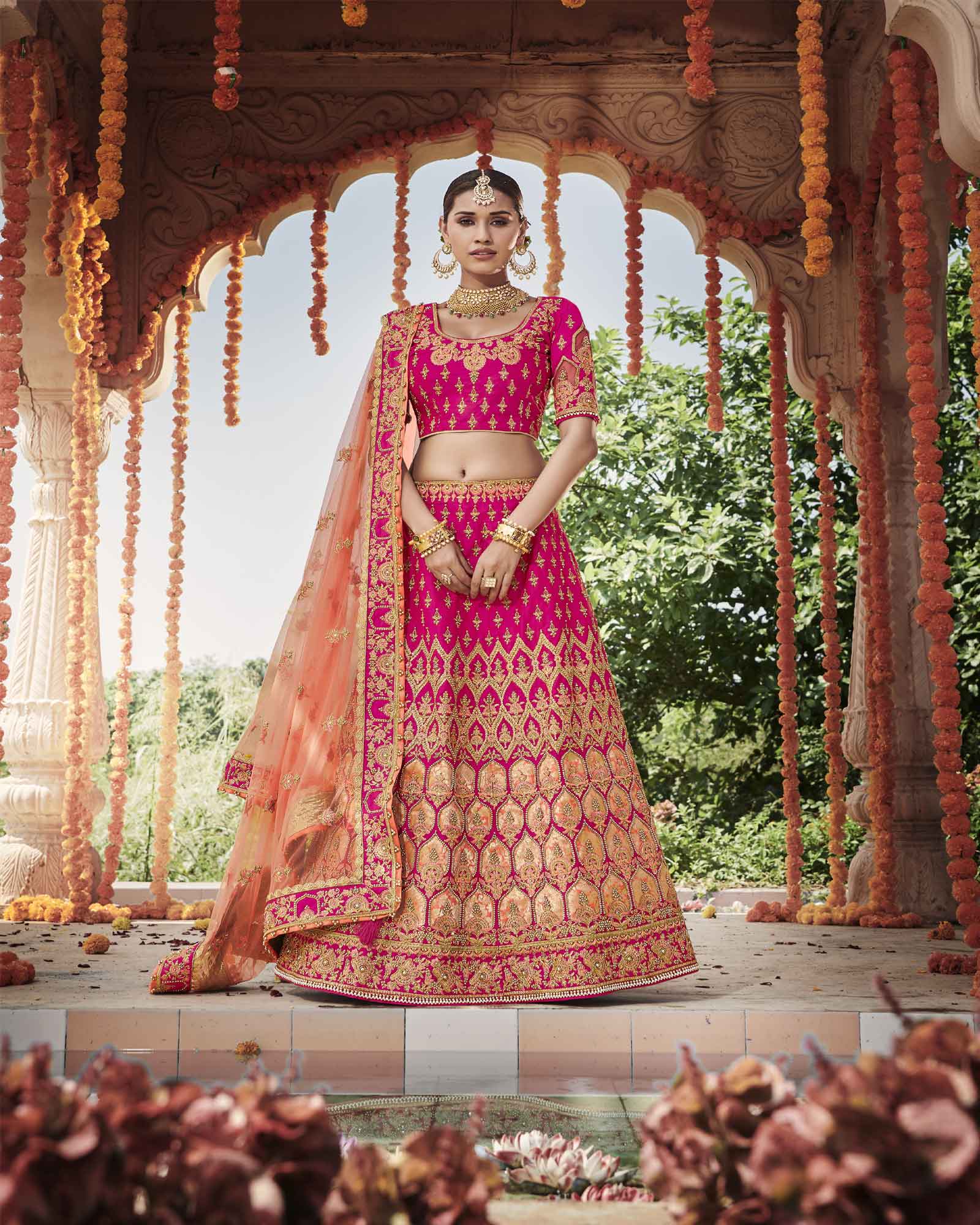 Hot Pink Silk Bridal Lehenga Choli With Heavy Thread Embroidery And Stone Work