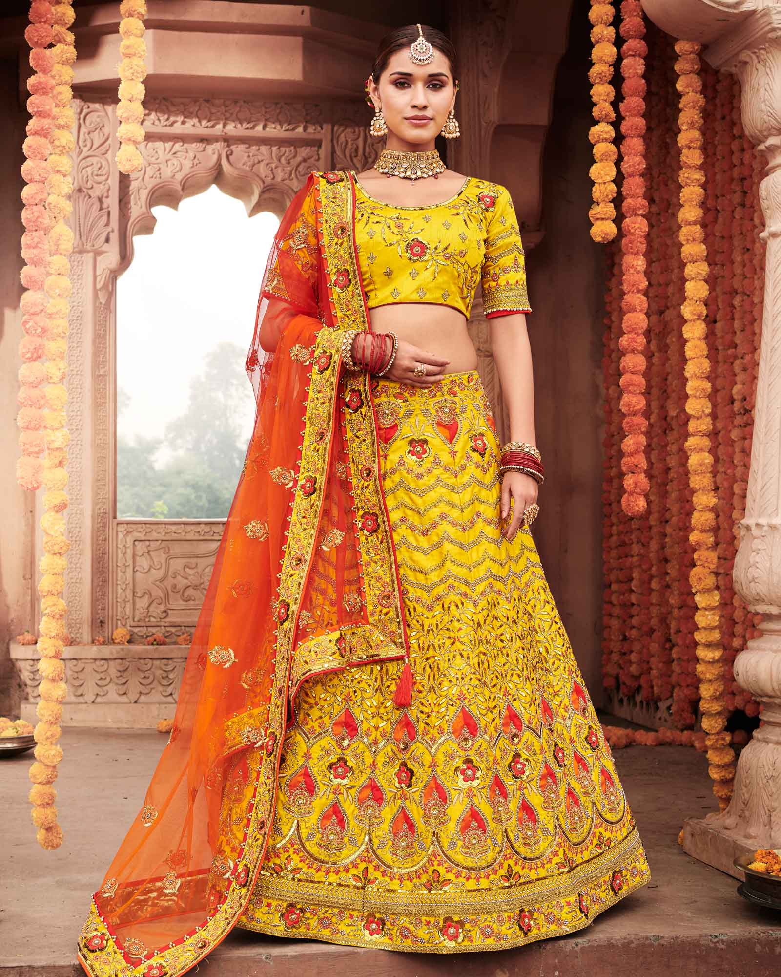 Corn Yellow Silk Bridal Lehenga Choli With Heavy Thread Embroidery And Stone Work