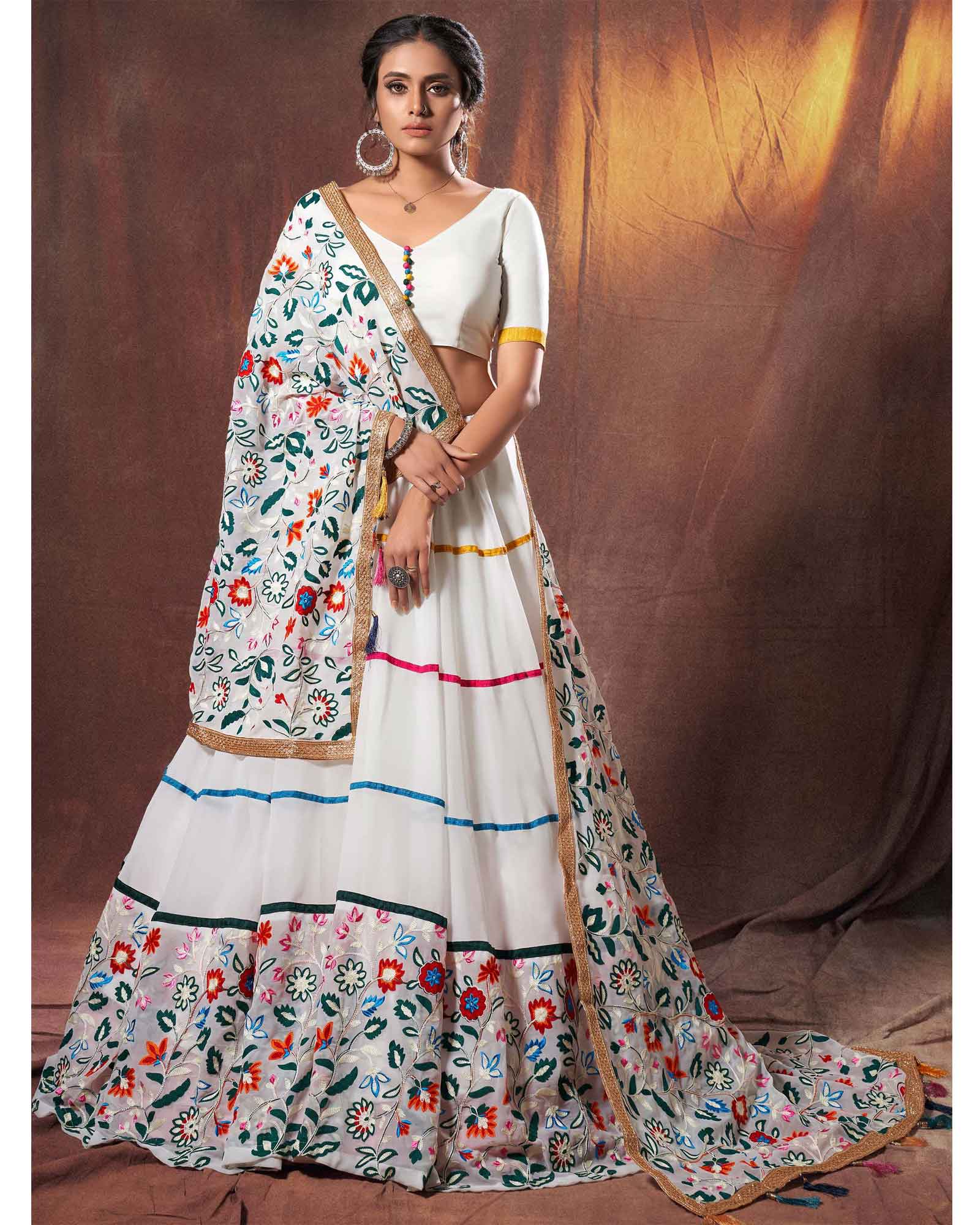 Off White Georgette Lehenga Choli with Multi Colored Floral Embroidered Border